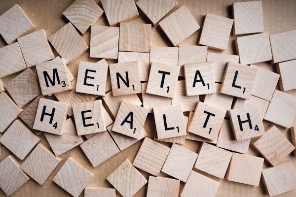 Mental Health Spelled in Scrabble Tiles